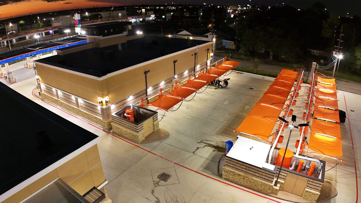 Aerial drone view of Spark Carwash at sunset