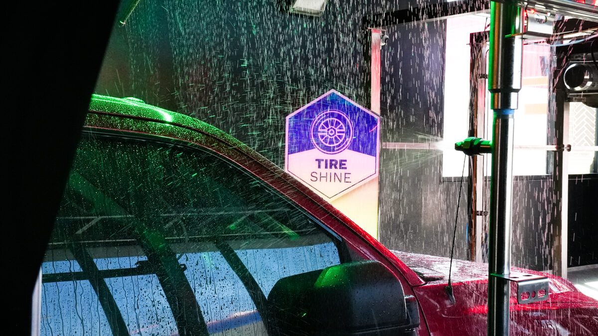 Tire shine application at Spark Carwash